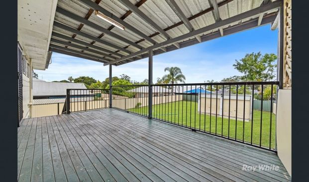 "Spacious 3-Bedroom Home with Multiple Living Areas, 2 Bathrooms, and a Large Yard â 63 Aquarius Drive, Kingston!" - Photo 1