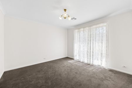 Refreshed Four-Bedroom Home With Gated Side Access - Photo 4