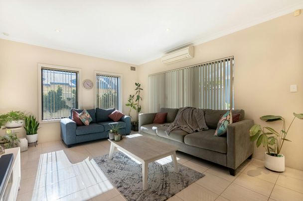 AVAILABLE NOW Coastal Living at Its Best -Spacious, Stylish & Superbly Located - Photo 1