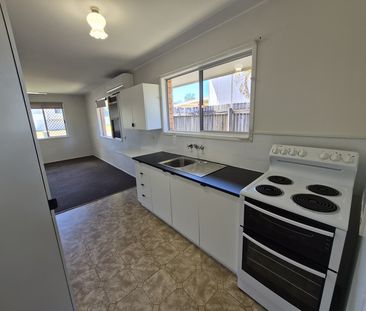 CONVENIENTLY LOCATED 2 BEDROOM DUPLEX - Photo 1
