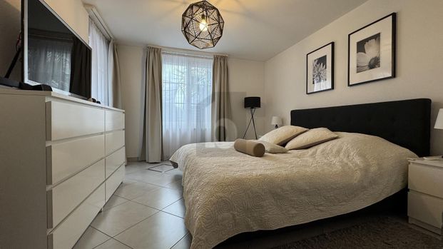 QUIETLY LOCATED, SPACIOUS AND LIGHT-FLOODED - Photo 1