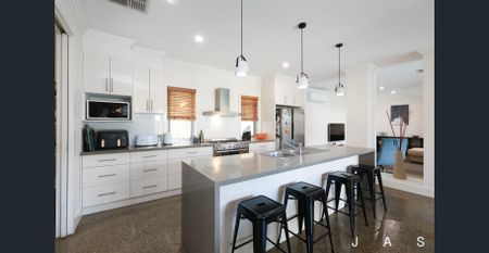 Spacious Family Living with Poolside Appeal - Photo 5