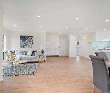 This modern 5-bedroom home offers space, comfort, and a great location - Photo 3