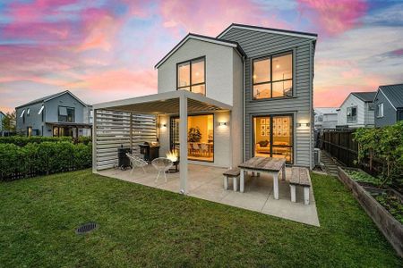 Modern 4-Bedroom Family Home in Prime Hobsonville - Photo 2