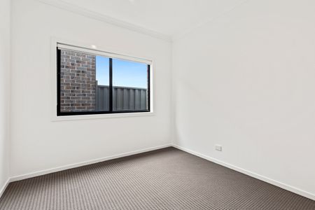 Spacious 4-Bedroom Home with Modern Features in Wollert - Photo 4