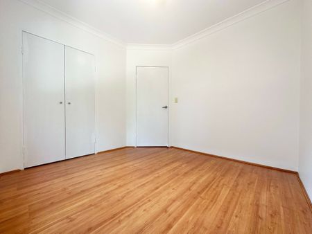 Refreshed 2 Bedroom Unit Close to Station! - Photo 2