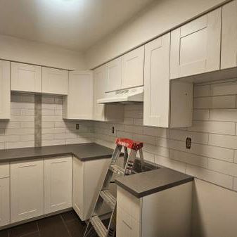 2-BED 1-BATH 2-level unit with a new kitchen & City View available NOW - Photo 1