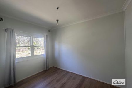 Rural home in the heart of town - Photo 2