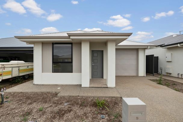 Modern Family Living in a Fast-Growing Eyre Community - Photo 1