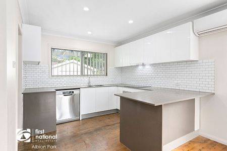 Discover Your Perfect Home: Rent This Charming House at 8 Amaral Ave, Albion Park NSW - Photo 3