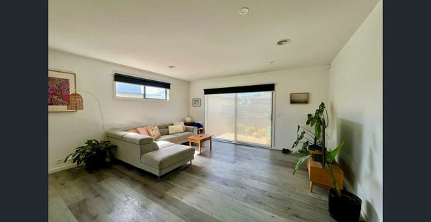 Modern Comfort with Double Garage & Entertaining Deck - Photo 1