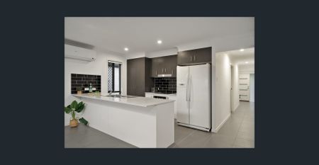 Well Presented Lowset Brick Home in Convenient Lawnton Location - Photo 3