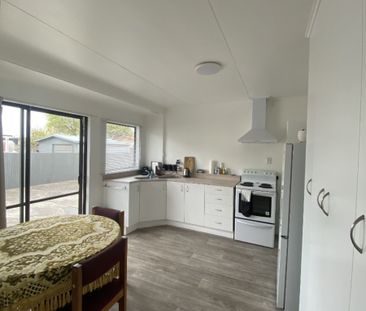 Modern, tidy and sunny unit in a great location. - Photo 3