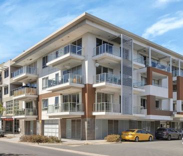 Top Floor 3 Bedroom Apartment in Mawson Central - Photo 1