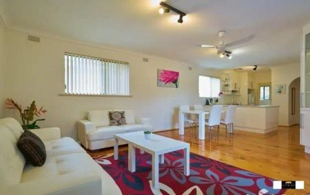 “Welcome to this spacious and secure courtyard homette near the CBD located at the rear of a small group of four.” - Photo 5
