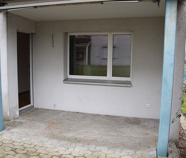 Charmante Wohnung mit Sitzplatz - Foto 1