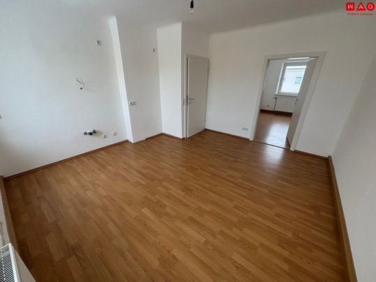 Idyllisches Wohnerlebnis in urbaner Lage steht für Sie bereit! Ruhig und grün gelegen wird Erholung pur geboten - gleichzeitig sorgt die erstklassige Infrastruktur für kurze Wege! Sofort verfügbar! - Foto 1