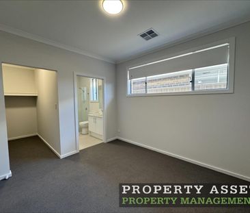 Stylish Brand-New Four Bedroom Home with Energy-Saving Solar - Photo 5