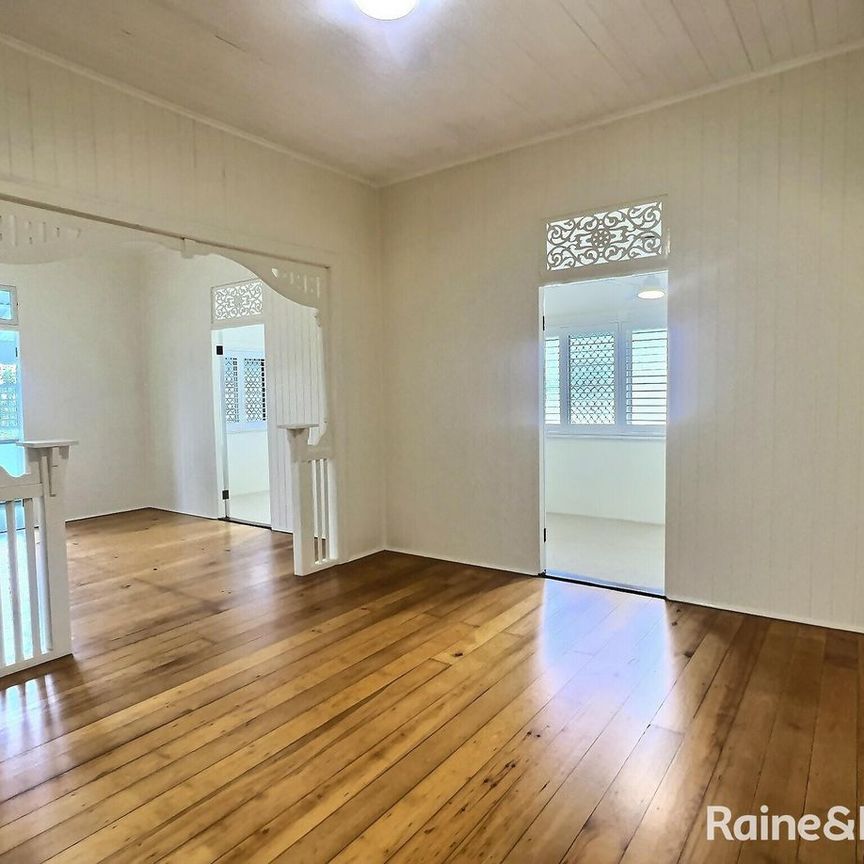 Neat & Comfortable Living in a Central Location! - Photo 1