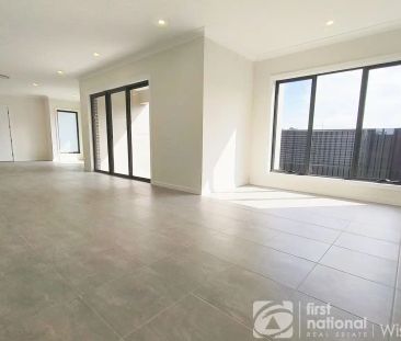 “Park front 4-bedroom family home in the Heart of Colebee - Walk to... - Photo 2