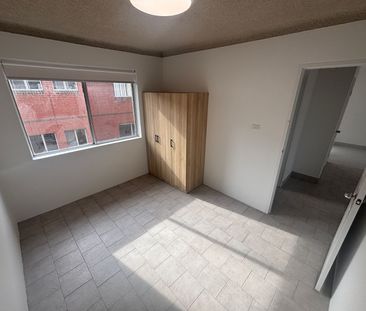 Modern & Convenient 2-Bedroom Unit – Updated & Ready to Move In! - Photo 4