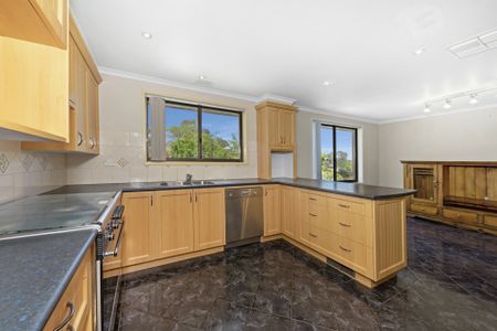 Stunning Three Bedroom Family Home with Pool, Solar and Large Gardens in a Prime Location! - Photo 5