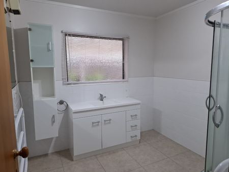 This fantastic family home offers a generous open-plan living on the ground floor, seamlessly flowing out to a rear patio and fully fenced yard—perfect for entertaining or relaxing with family. - Photo 5