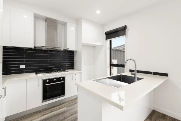 “Modern & Bright with Compact Comfort!” - Photo 1