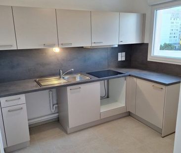 T4 AVEC LOGGIA + PARKINGS - Photo 1