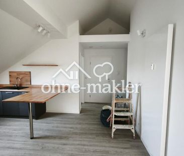 Erstbezug: Wunderschöne Dachgeschosswohnung in bester Lage - Photo 1