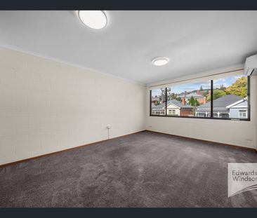 Modern Two-Bedroom Unit in Prime Location - Photo 2