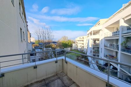 Appartement T1 de 31 m² avec terrasse et loggia en étage élevé d'une résidence récente avec ascenseur - Photo 4