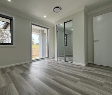 Brand New 5 Bedroom Family Home - Photo 6