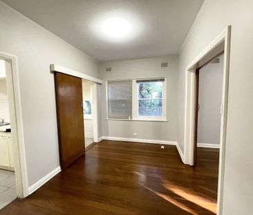 Large two bedroom ground floor unit with single garage - Photo 6