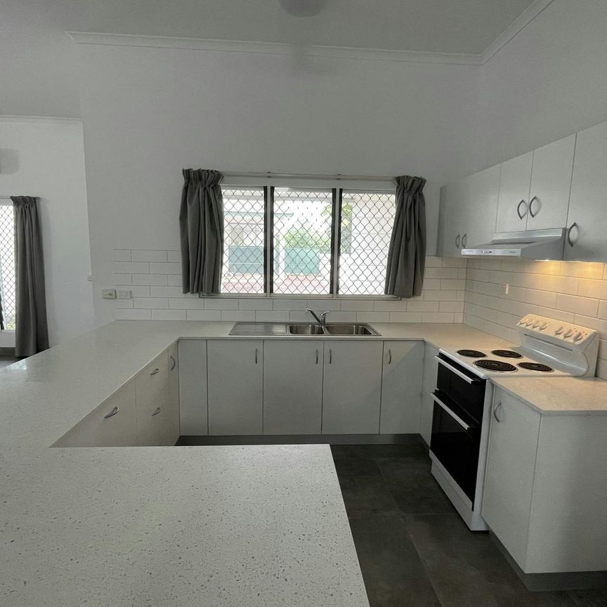 NEAT UNIT IN QUIET COMPLEX CLOSE TO SCHOOLS - Photo 1