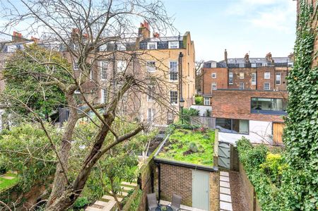 A stunning four bedroom, end of terrace home, set across three floors in a sought after Islington location. - Photo 5