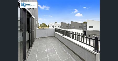 Modern & Spacious Three-Bedroom Townhouse in Prime Location! - Photo 2