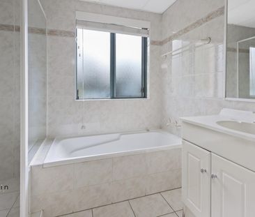 Sunlit Apartment with Ultimate Convenience - Photo 4