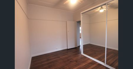 2 Bedroom Home with Sunroom, In A Great Position - Photo 5