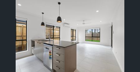 Stunning Family Home in Logan Reserve - Photo 2