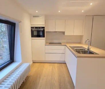 Ruim en volledig vernieuwd 2-slaapkamerappartement te huur in Brugge - Photo 3