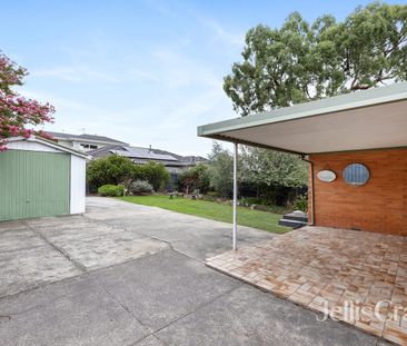 Stylish Family Home with Modern Bathroom & Spacious Living - Photo 6