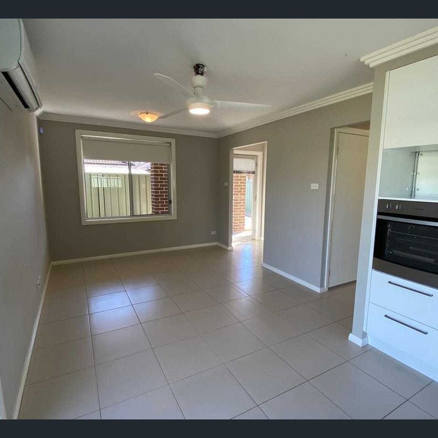 Positioned in a quiet and convenient location, this well-presented two-bedroom home offers comfortable, low-maintenance living. - Photo 1