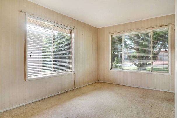 Spacious Family Living in Sought-After East Toowoomba - Photo 1