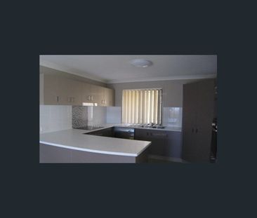 BEAUTIFUL FAMILY HOME IN THE HEART OF REDBANK PLAINS - Photo 1