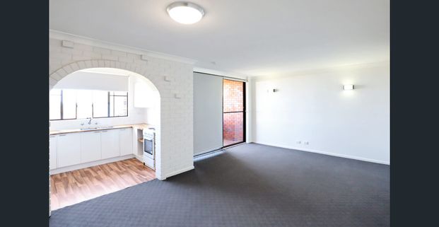 Modern Comfort in a Convenient Coastal Setting - Photo 1