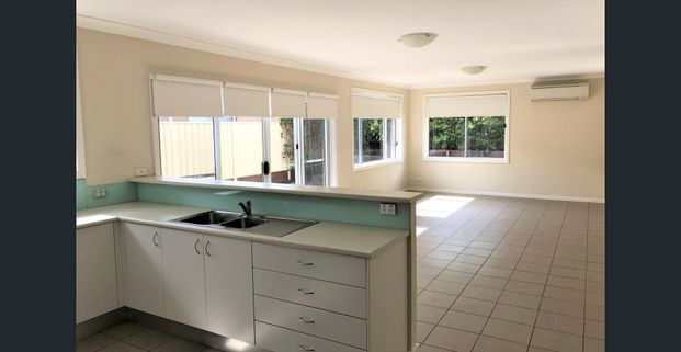 Modern 3-Bedroom Home with Comfort & Convenience - Photo 1