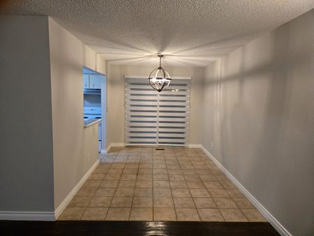 A Charming Home located in a Quiet Neighborhood with a Spacious Backyard - Photo 2