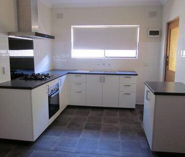 UPDATED UNIT - GROUP OF 3 - CONVENIENT LOCATION - Photo 1