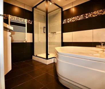 Ruime, energiezuinige woning met 2 slpk, garage, patio, tuin en ter... - Photo 2